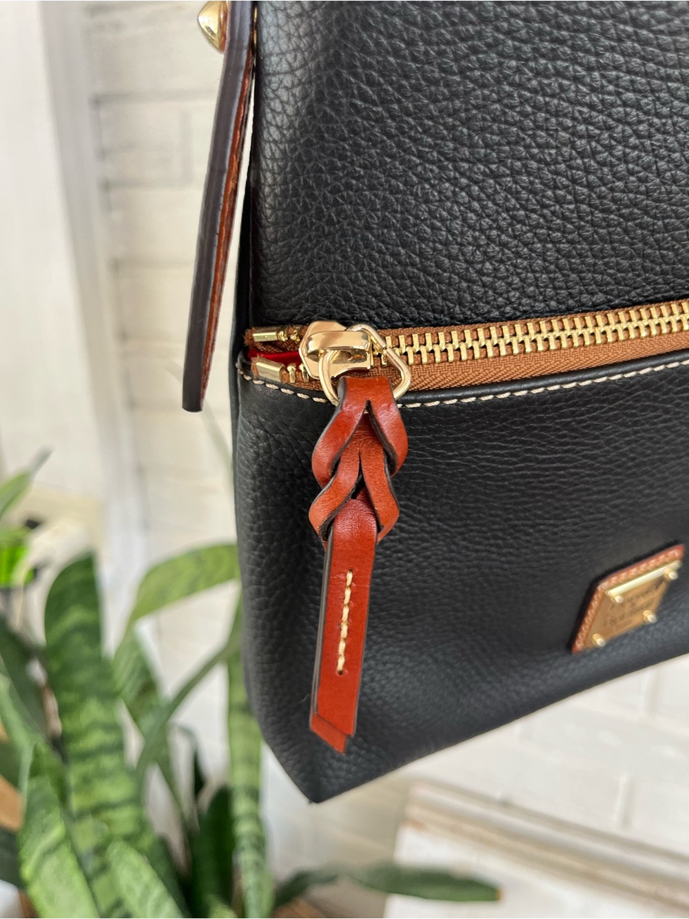 Dooney & Bourke black leather letter carrier crossbody purse, brown leather trim - Picture 4 of 12